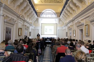 Delegates listen to composer and music therapist Nigel Osborne speaking at the conference. Photo: Robert Piwko